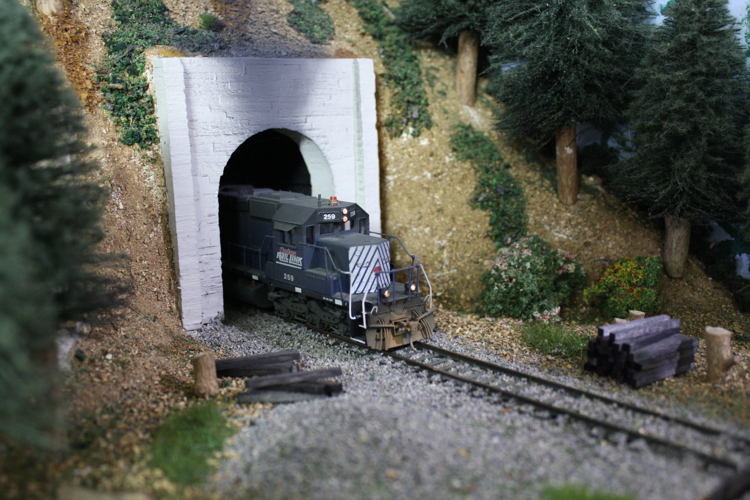 MRL helpers emerge from a tunnel. Gordon Fletcher|Photo Gallery