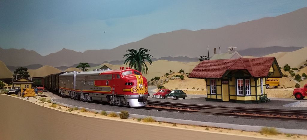 fast_mail_passing_through_clinton|Santa Fe Railway, Los Angeles Division